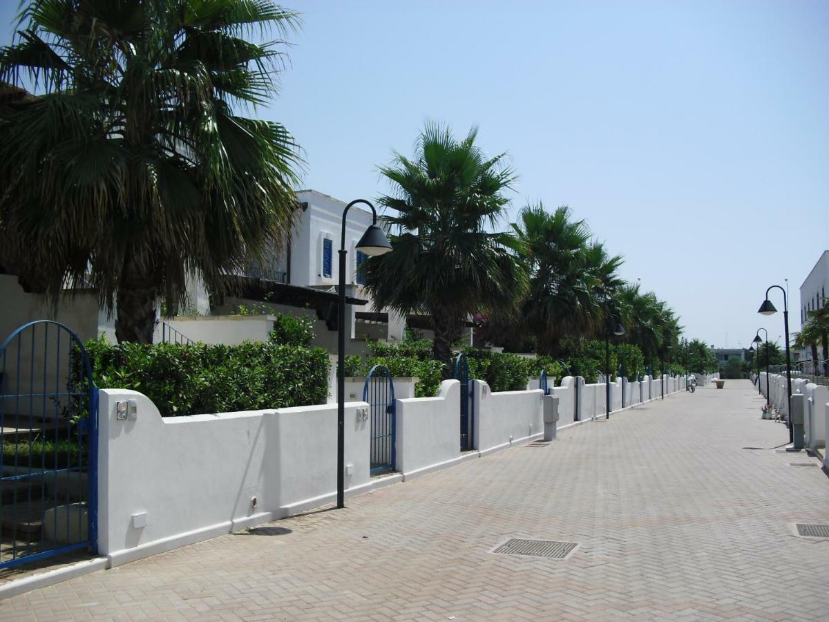 Villa In Villaggio Порто-Чезарео Экстерьер фото