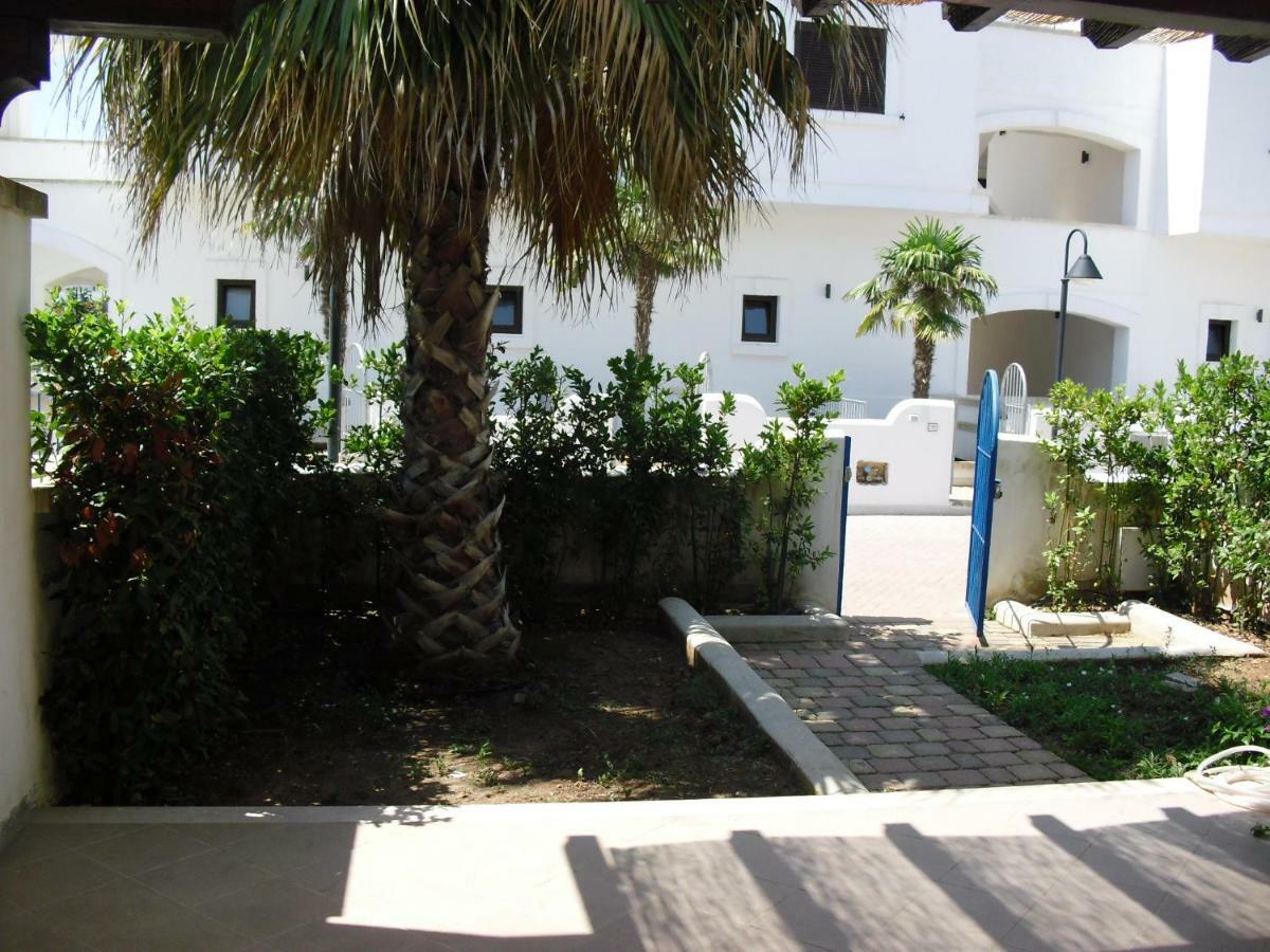 Villa In Villaggio Порто-Чезарео Экстерьер фото